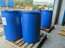 Blue drum for chemical storage on power plant process. The photo is suitable to use for industry background photography, power plant poster and electricity content media.