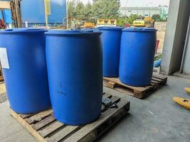 Blue drum for chemical storage on power plant process. The photo is suitable to use for industry background photography, power plant poster and electricity content media.