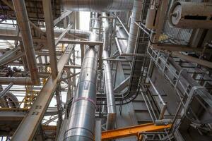 Heat recovery Steam Generator with pipe line, air intake and Up stair. The photo is suitable to use for industry background photography, power plant poster and electricity content media.