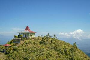 Aerial view from peak of domestic mountain Central Java Semarang. The photo is suitable to use for adventure content media, nature poster and forest background.