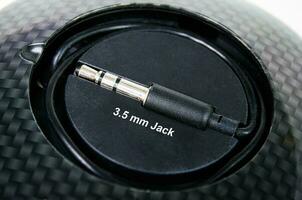 Close up of 3.5 mm male jack for audio stereo input of amplifier receiver. photo