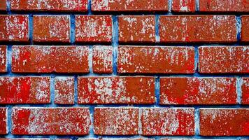 Shabby red brick wall background photo