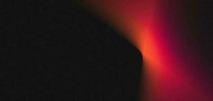 Red glowing abstract color gradient wave shape on black grainy background copy space, minimal wide banner web header cover poster design photo
