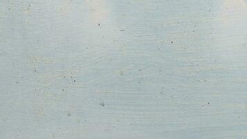 Pale blue sky background with wall paint texture photo