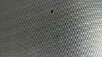 Black texture of laptop case surface photo