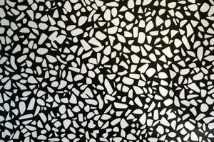 White and black terrazzo floor texture background. Abstract pattern. photo