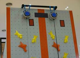 Artificial climbing wall. Extreme sports concept photo