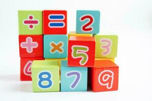 Number wood block cubes for learning Mathematic, education math concept. photo