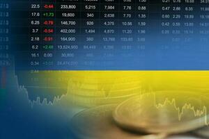 Ukraine flag with stock market finance, economy trend graph digital technology. photo