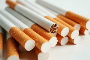 Cigarette, roll tobacco in paper with filter tube, No smoking concept. photo