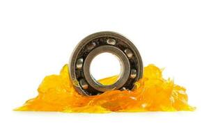 Grease and ball bearing  isolated on white background with clipping path, lithium machinery lubrication for automotive and industrial. photo