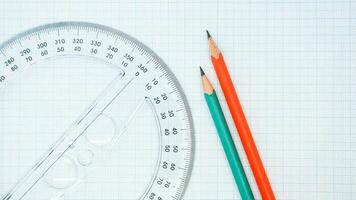 High Angle View Of Pencil With Graph Paper And Ruler photo