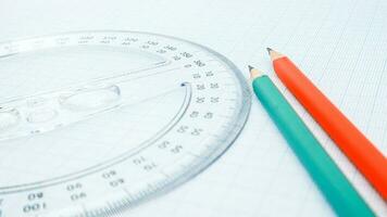 High Angle View Of Pencil With Graph Paper And Ruler photo