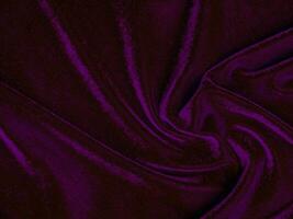 Purple velvet fabric texture used as background. Empty purple fabric background of soft and smooth textile material. There is space for text. photo