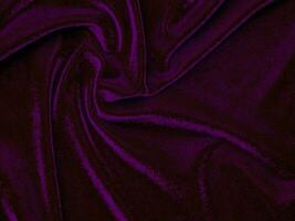 Purple velvet fabric texture used as background. Empty purple fabric background of soft and smooth textile material. There is space for text. photo