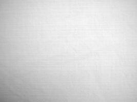 White velvet fabric texture used as background. White cotton background of soft and smooth textile material. There is space for text. photo