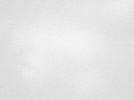 Seamless texture of white cement wall a rough surface, with space for text, for a background... photo