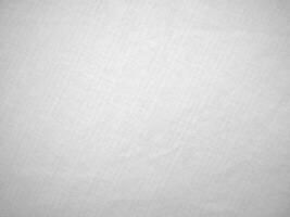 White velvet fabric texture used as background. White cotton background of soft and smooth textile material. There is space for text. photo