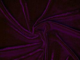 Purple velvet fabric texture used as background. Empty purple fabric background of soft and smooth textile material. There is space for text. photo