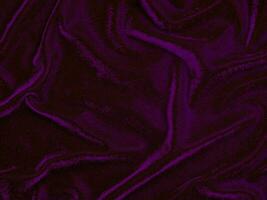 Purple velvet fabric texture used as background. Empty purple fabric background of soft and smooth textile material. There is space for text. photo