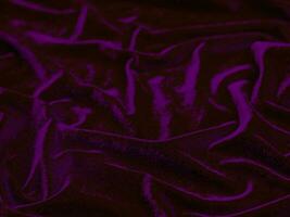 Purple velvet fabric texture used as background. Empty purple fabric background of soft and smooth textile material. There is space for text. photo