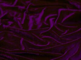 Purple velvet fabric texture used as background. Empty purple fabric background of soft and smooth textile material. There is space for text. photo