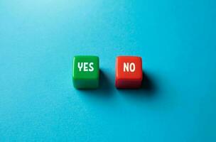 Yes or No. Choice between acceptance and rejection. Decision making, voting. Weighing the pros and cons. Symbol of power and responsibility, informed choices photo