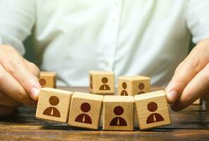 Leader and weak unstable team. Working with human resources. Hiring and recruiting. Recruitment of an effective team. Retraining before being assigned to a new project. Relocation to a new place photo
