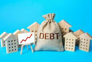 Rise of debt and town houses. The growth of the municipality's debts. Municipal budgeting. High maintenance and repair costs and low tax revenues. Rental business bad profitability. Debt restructuring photo