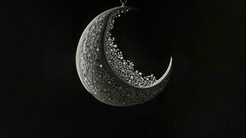 Hanging Exquisite Crescent Moon On Dark Background. 3D Render. Islamic Festival Concept. photo