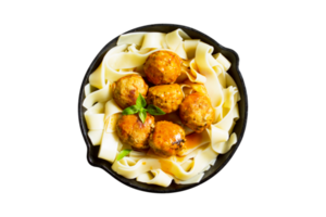 Fettuccine pasta with homemade beef meatballs on transparent background png