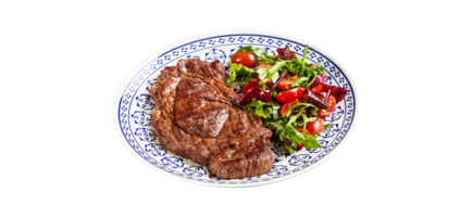 Grilled steaks and vegetable salad on transparent background png