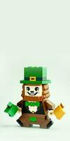 3D Render of Pixel Art or Blocks Leprechaun Toy Holding Hammers And Copy Space. St. Patrick's Day Concept. photo