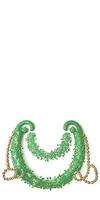 3D Render of Shiny Horseshoe Pendant In Green And Golden Color. St. Patrick's Day Concept. photo