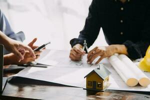 architect man working with laptop and blueprints,engineer inspection in workplace for architectural plan,sketching a construction project ,selective focus,Business concept vintage color photo