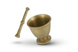 Antique brass mortar with pestle isolated on white background photo