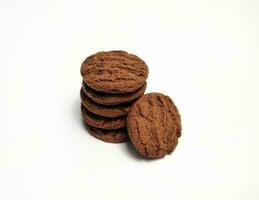 Stack of chocolate biscuits isolated on a white background. photo