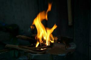 The fire in the blazing brazier Thai kitchen style, ready to be used for cooking according to the way of the Thai villagers.soft and selective focus. photo