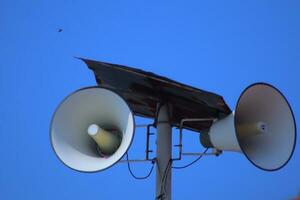 the mosque's toa is used as a loudspeaker when it's time to pray photo