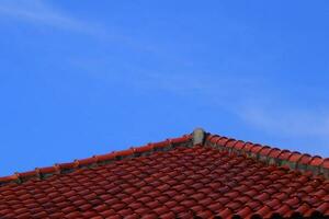 The roof of red tiles laid out photo