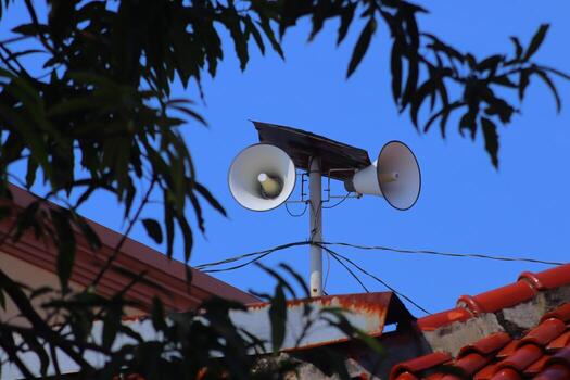 the mosque's toa is used as a loudspeaker when it's time to pray photo