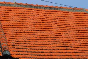 The roof of red tiles laid out photo