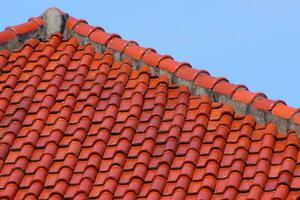 The roof of red tiles laid out photo