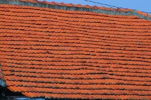 The roof of red tiles laid out photo