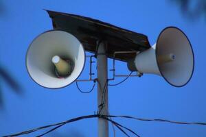 the mosque's toa is used as a loudspeaker when it's time to pray photo