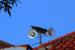 the mosque's toa is used as a loudspeaker when it's time to pray photo