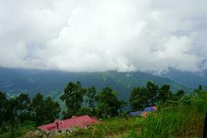 View of Green Mountain Range from the Top of lungchok at East Sikkim photo
