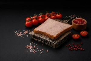 Delicious crispy toast with chicken or goose pate with salt and spices photo