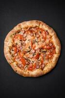 Bavarian pizza with smoked sausages, tomatoes, cheese, salt and spices photo