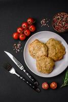 Delicious fried chopped fillet pancakes with spices, salt and herbs photo